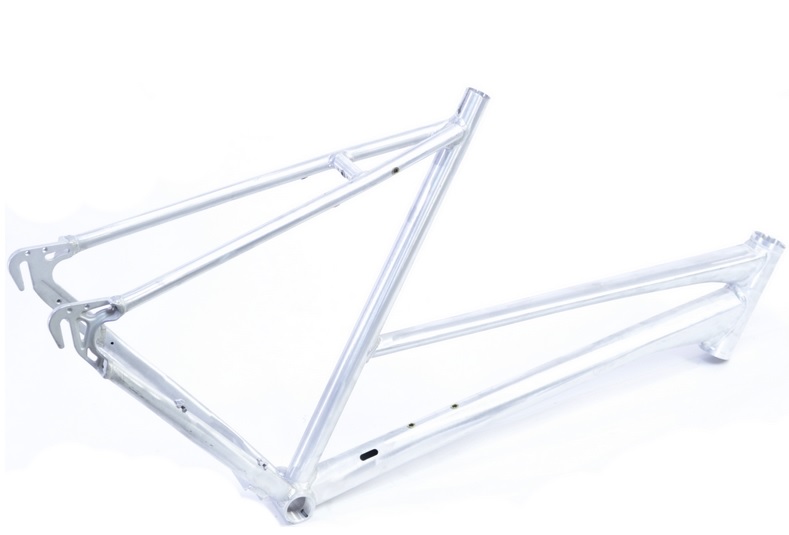 28" CNC Tour One Lady Nexus/SS Rahmen 56 cm raw silber